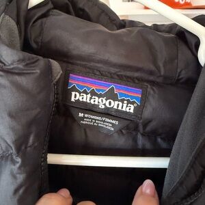 Women’s gently used Patagonia black down jacket size medium
